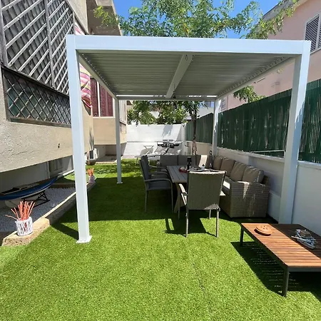 House With Garden Near The And Ac
